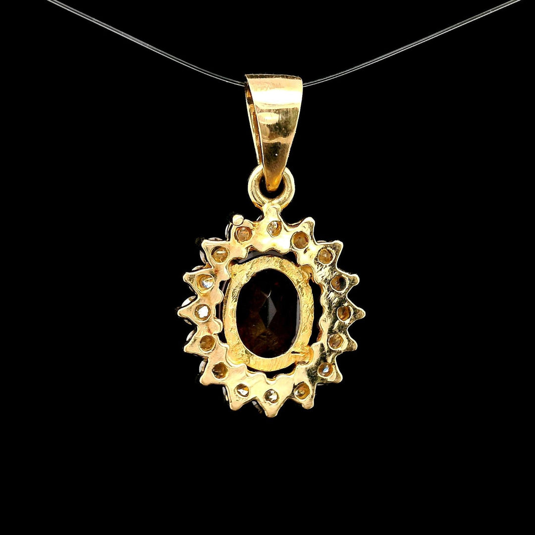 18k Yellow Gold Red Garnet and 0.50cttw Diamond Halo Pendant