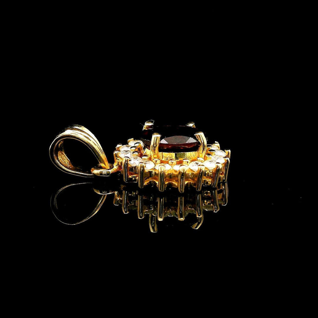 18k Yellow Gold Red Garnet and 0.50cttw Diamond Halo Pendant