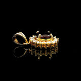 18k Yellow Gold Red Garnet and 0.50cttw Diamond Halo Pendant