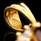 18k Yellow Gold Red Garnet and 0.50cttw Diamond Halo Pendant
