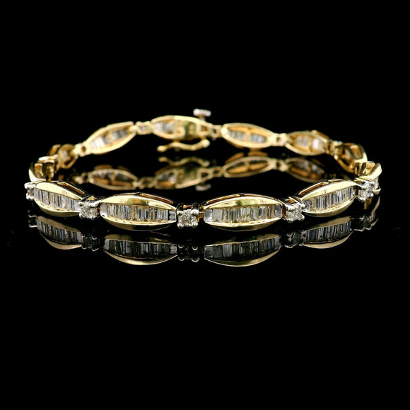 14k Yellow Gold and 2.5cttw Baguette and Round Diamond Bracelet 7.25