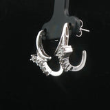 14k White Gold and 0.50cttw Diamond Huggie Earrings