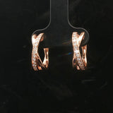 14k Rose Gold and 0.25cttw Diamond Crossover Huggie Earrings