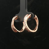 14k Rose Gold and 0.25cttw Diamond Crossover Huggie Earrings