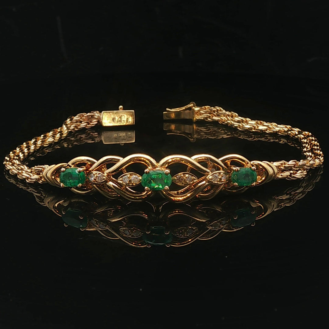 14k Yellow Gold Emerald and Diamond 11.8g Two Strand Rope Bracelet 7"