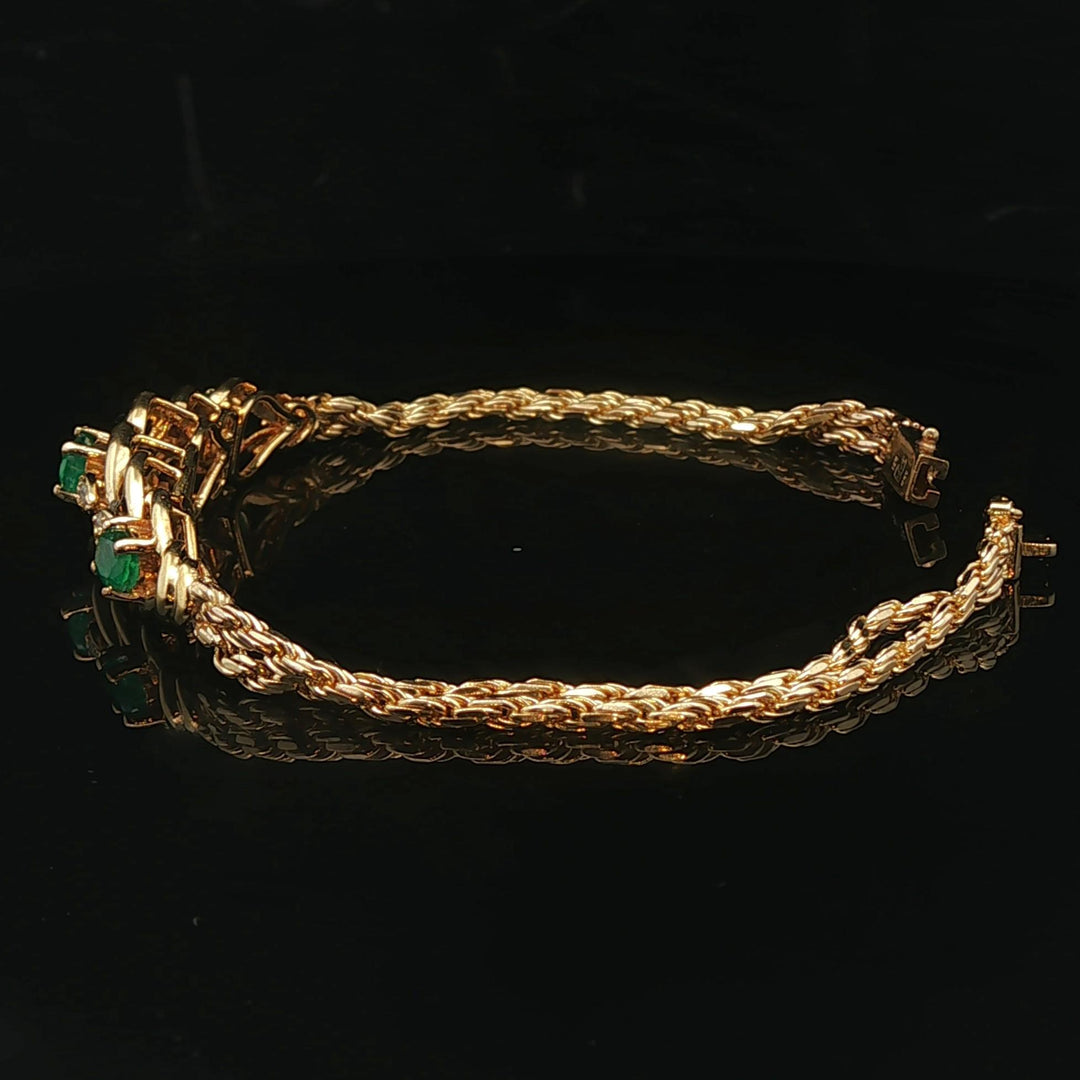 14k Yellow Gold Emerald and Diamond 11.8g Two Strand Rope Bracelet 7"