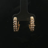 14k Yellow Gold and 0.25cttw Round and Baguette Diamond Huggie Earrings