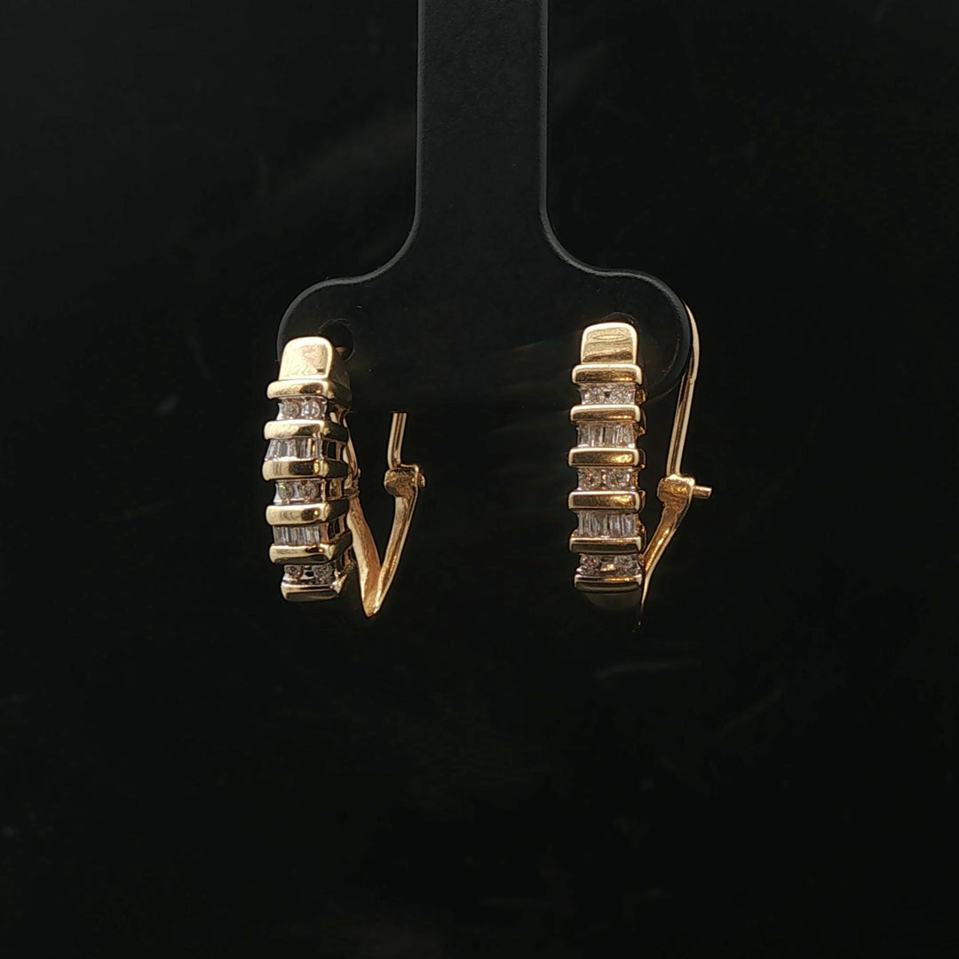 14k Yellow Gold and 0.25cttw Round and Baguette Diamond Huggie Earrings