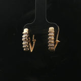 14k Yellow Gold and 0.25cttw Round and Baguette Diamond Huggie Earrings