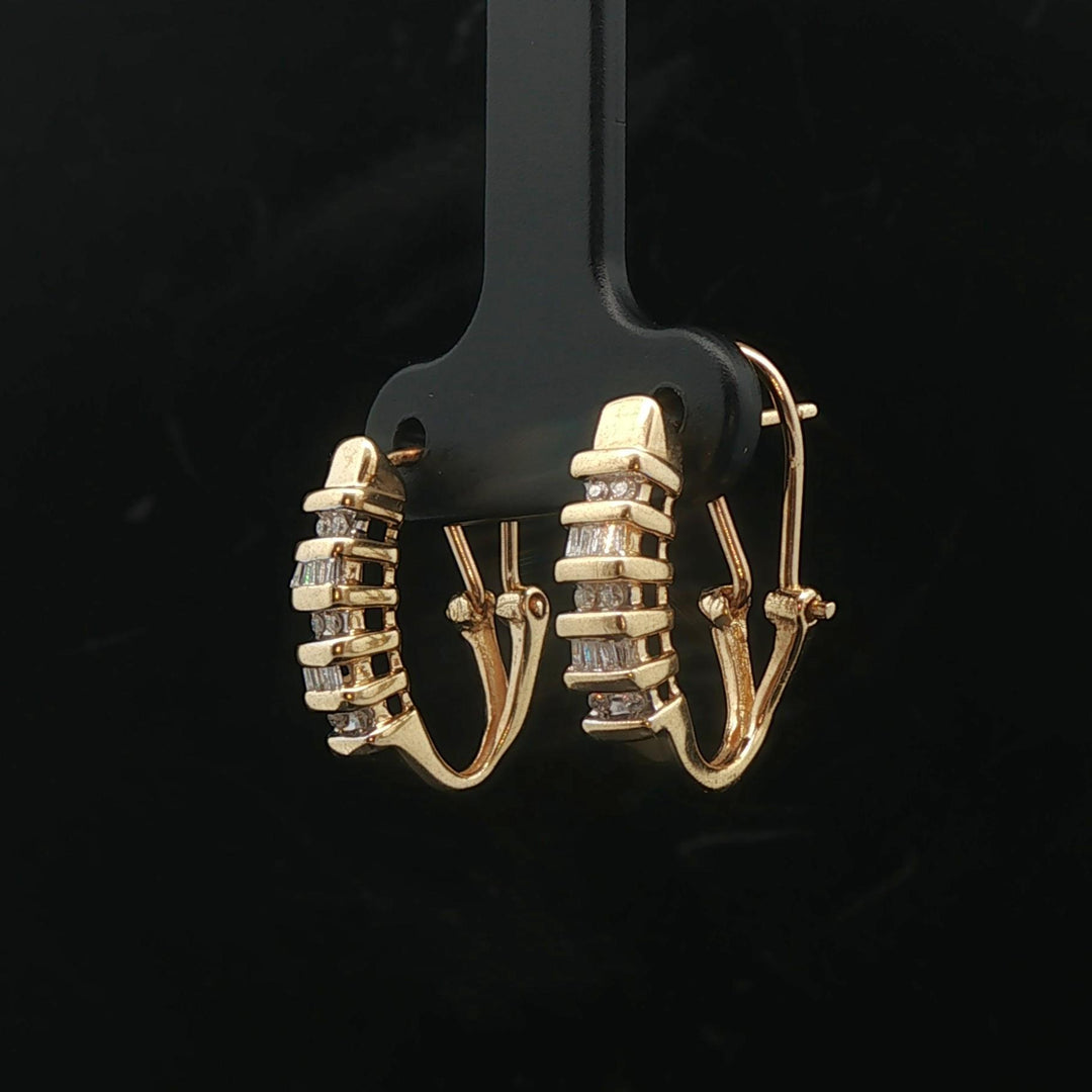 14k Yellow Gold and 0.25cttw Round and Baguette Diamond Huggie Earrings