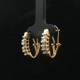 14k Yellow Gold and 0.25cttw Round and Baguette Diamond Huggie Earrings