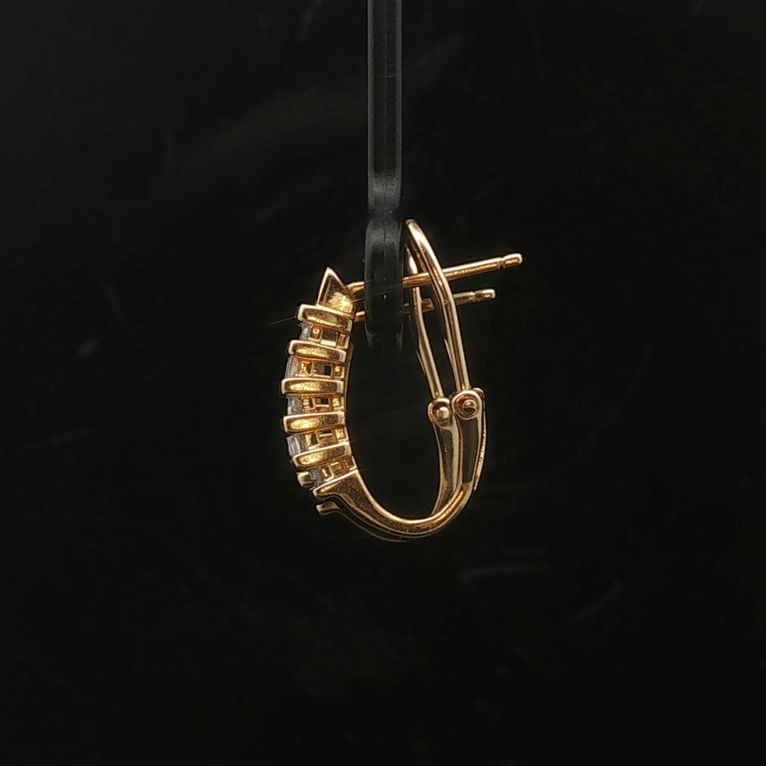 14k Yellow Gold and 0.25cttw Round and Baguette Diamond Huggie Earrings