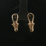 14k Yellow Gold and 0.25cttw Round and Baguette Diamond Huggie Earrings