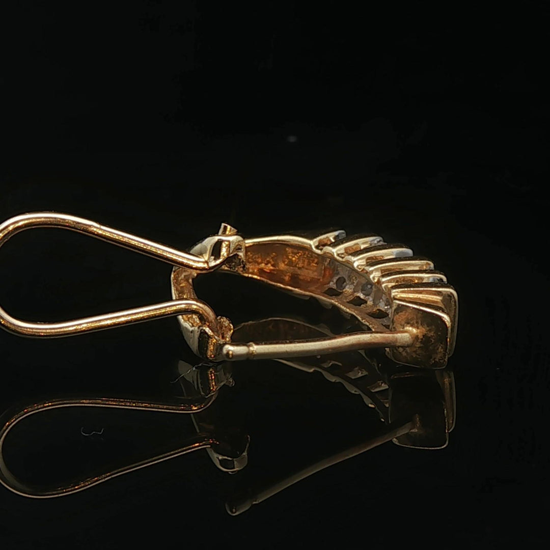 14k Yellow Gold and 0.25cttw Round and Baguette Diamond Huggie Earrings