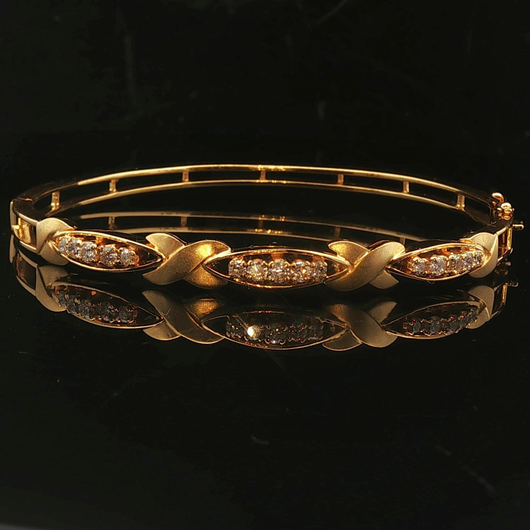 18k Yellow Gold and Diamond 15.6g Fancy X Bangle Bracelet 6.75"