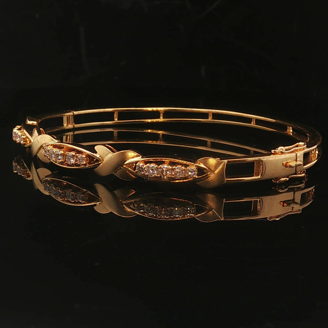 18k Yellow Gold and Diamond 15.6g Fancy X Bangle Bracelet 6.75"
