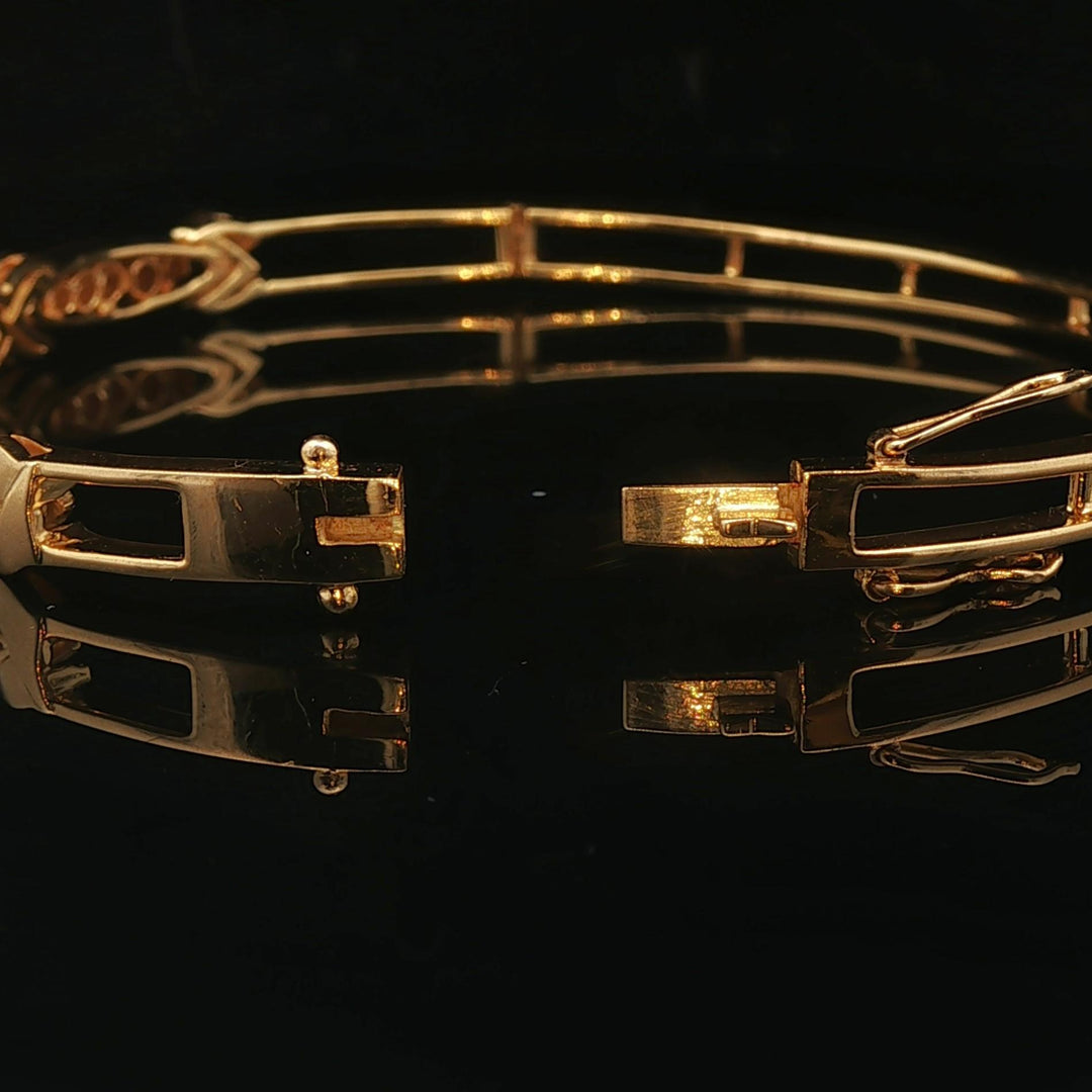 18k Yellow Gold and Diamond 15.6g Fancy X Bangle Bracelet 6.75"