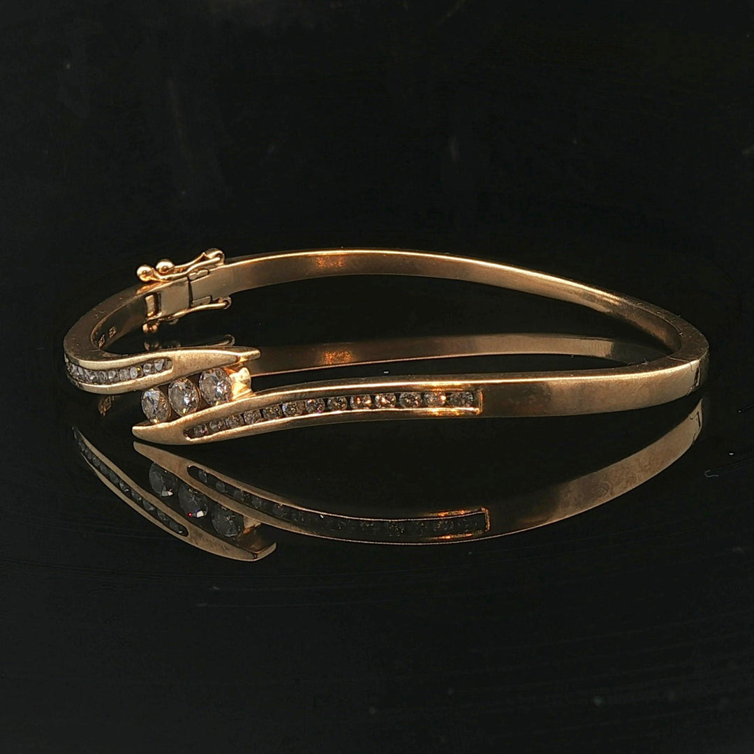 14k Yellow Gold 16.7g and 1cttw Diamond Vintage Bypass Bangle Bracelet 6.75"