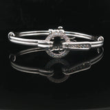 18k White Gold and Diamond 20.5g Circle Motif Bangle Bracelet 6.25"