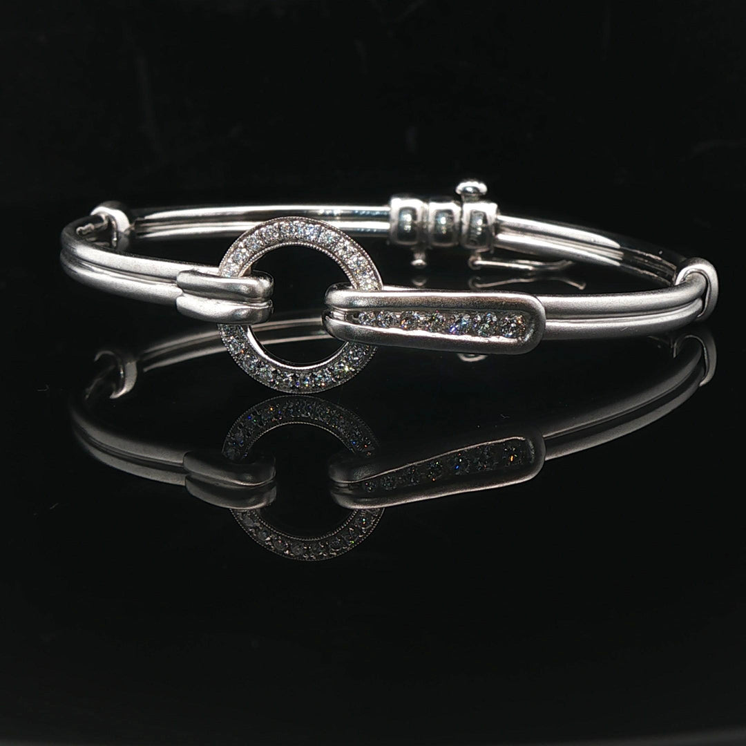 18k White Gold and Diamond 20.5g Circle Motif Bangle Bracelet 6.25"
