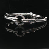 18k White Gold and Diamond 20.5g Circle Motif Bangle Bracelet 6.25"
