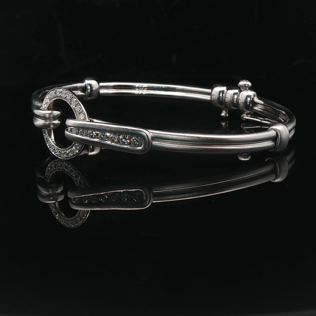 18k White Gold and Diamond 20.5g Circle Motif Bangle Bracelet 6.25"