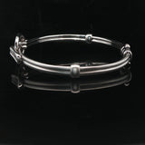 18k White Gold and Diamond 20.5g Circle Motif Bangle Bracelet 6.25"