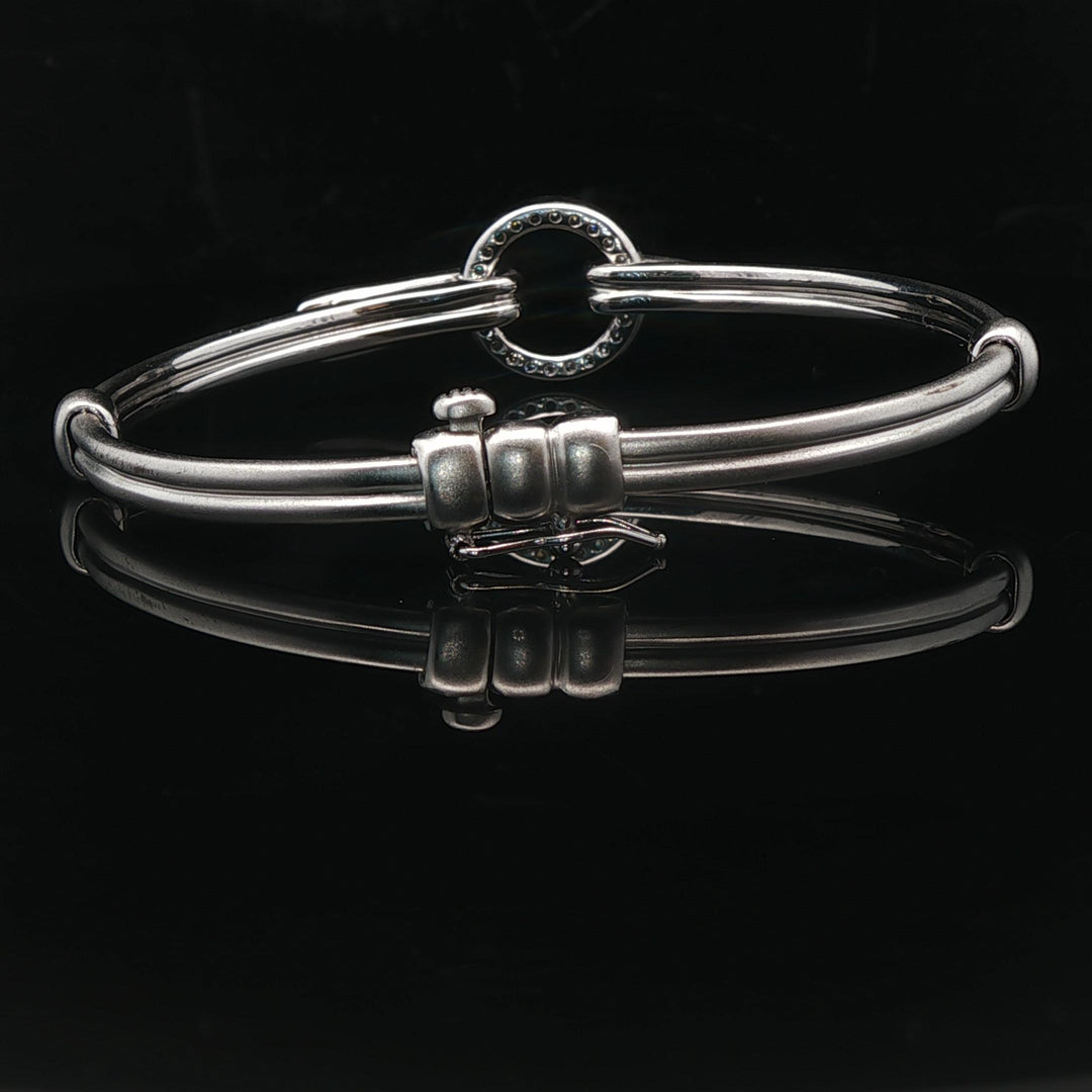 18k White Gold and Diamond 20.5g Circle Motif Bangle Bracelet 6.25"