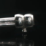 18k White Gold and Diamond 20.5g Circle Motif Bangle Bracelet 6.25"