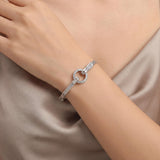 18k White Gold and Diamond 20.5g Circle Motif Bangle Bracelet 6.25"