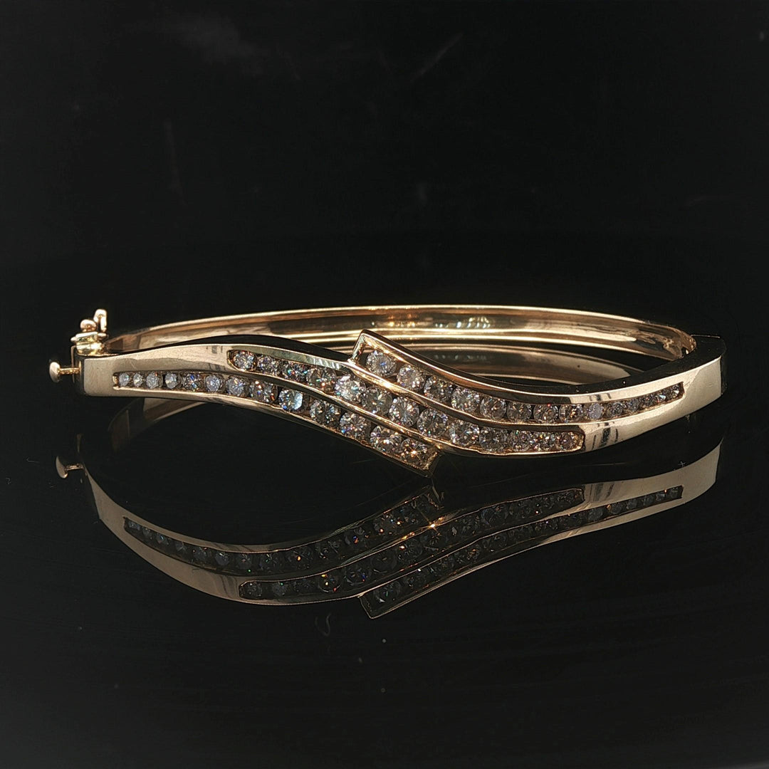 14k Yellow Gold 21g and 1.5cttw Diamond Vintage Bypass Bangle Bracelet 6.75"