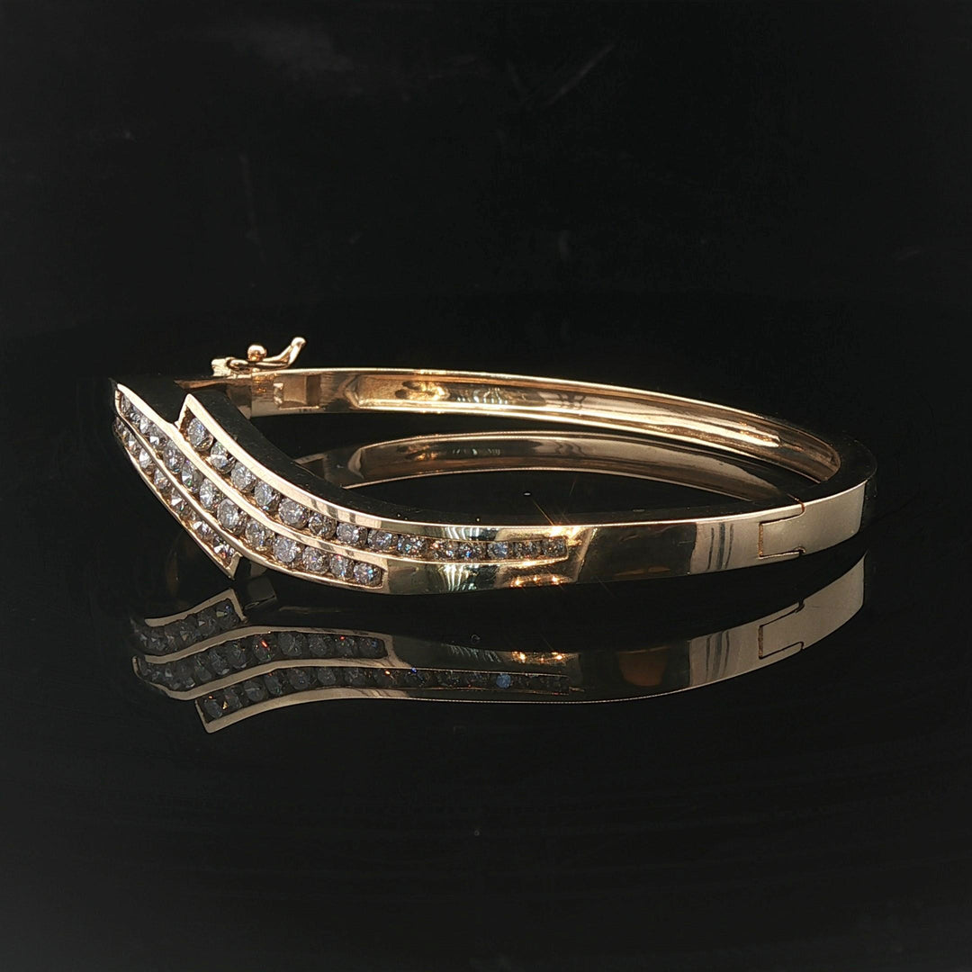 14k Yellow Gold 21g and 1.5cttw Diamond Vintage Bypass Bangle Bracelet 6.75"