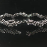 18k White Gold and 2.7cttw Diamond Heavy 25.7g Wave Bangle Bracelet 7"