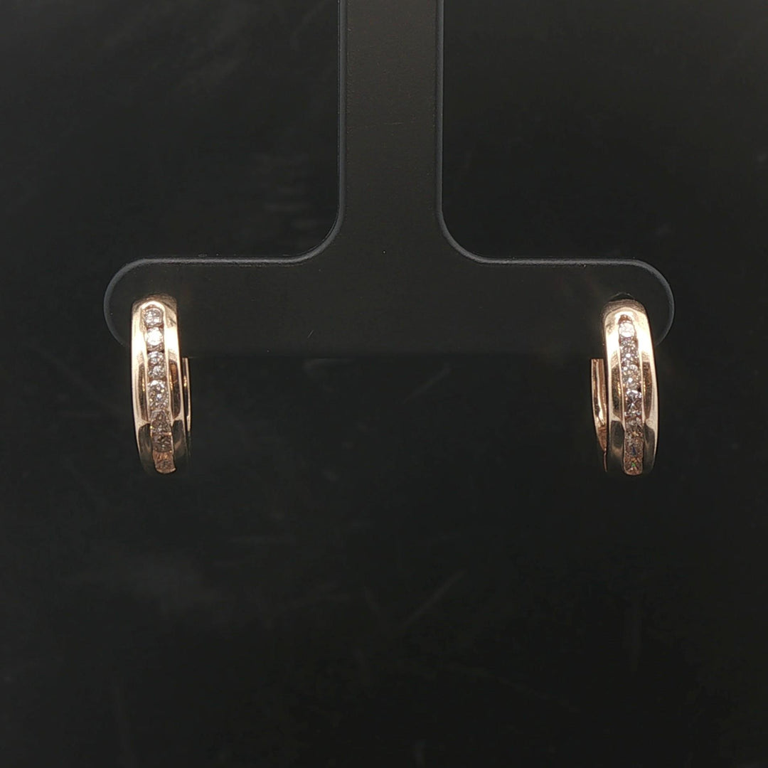 14k Yellow Gold and 0.25cttw Diamond Huggie Earrings