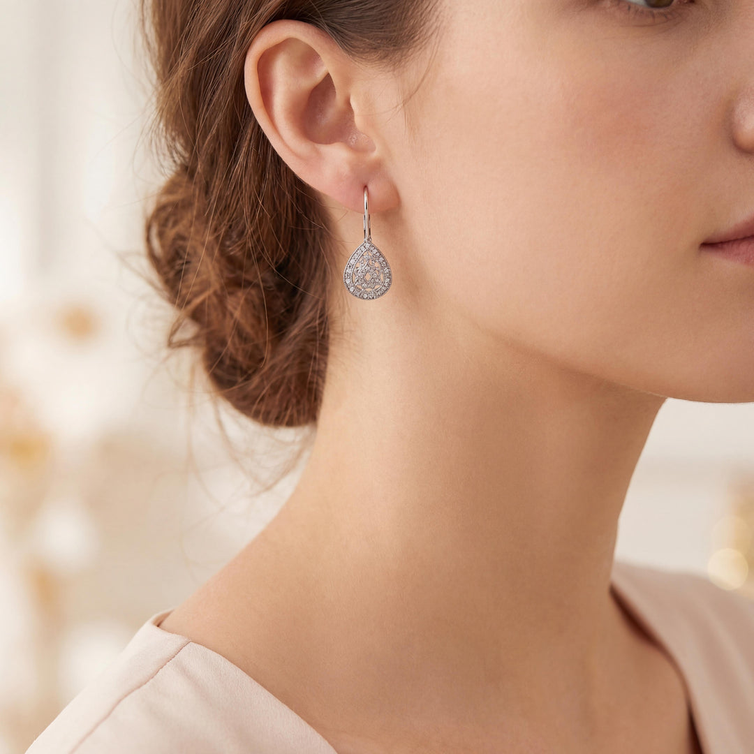 14k White Gold and 0.20cttw Diamond Vintage Filigree Tear Drop Earrings 1"