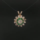 14k Yellow Gold Emerald and 0.50cttw Diamond Halo Pendant