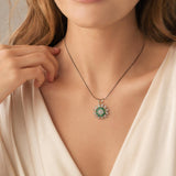 14k Yellow Gold Emerald and 0.50cttw Diamond Halo Pendant