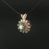 14k Yellow Gold Emerald and 0.50cttw Diamond Halo Pendant