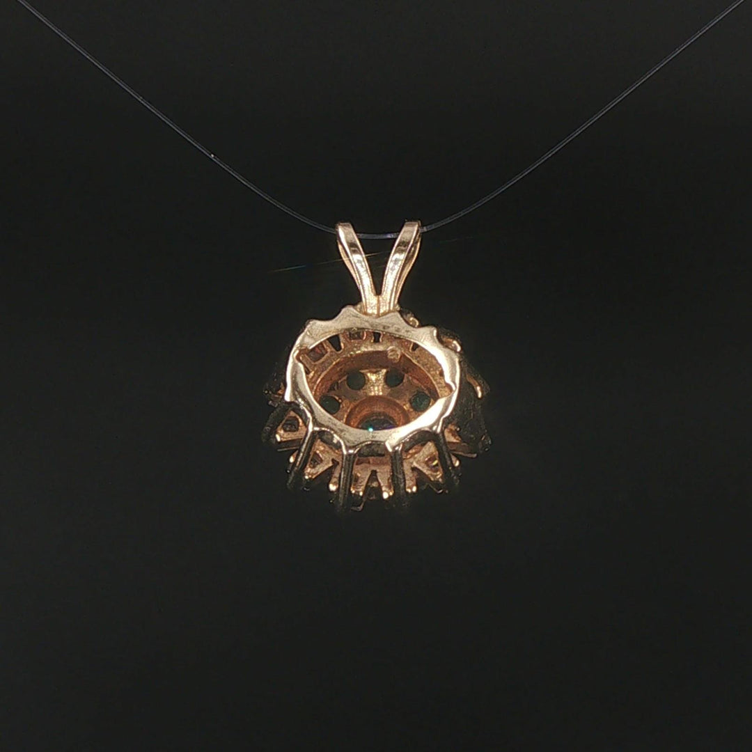 14k Yellow Gold Emerald and 0.50cttw Diamond Halo Pendant