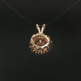 14k Yellow Gold Emerald and 0.50cttw Diamond Halo Pendant