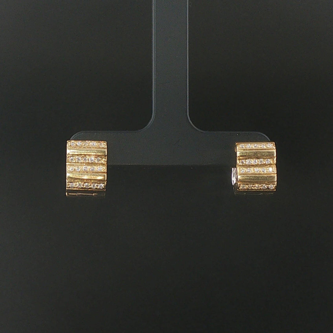 18k Yellow and White Gold 0.20cttw Diamond Solid Huggie Earrings