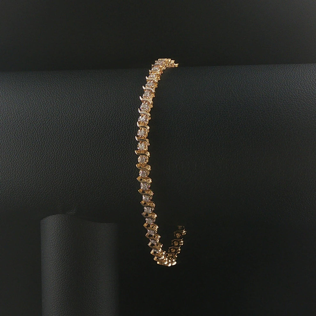 14k Yellow Gold and 0.50cttw Diamond S Link Thin Tennis Bracelet 7"