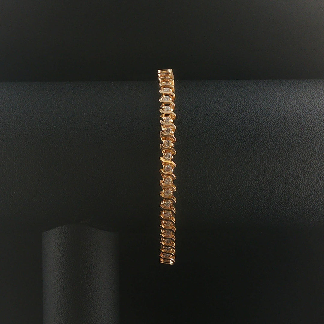 14k Yellow Gold and 1.50cttw Diamond S Link Vintage Tennis Bracelet 7"