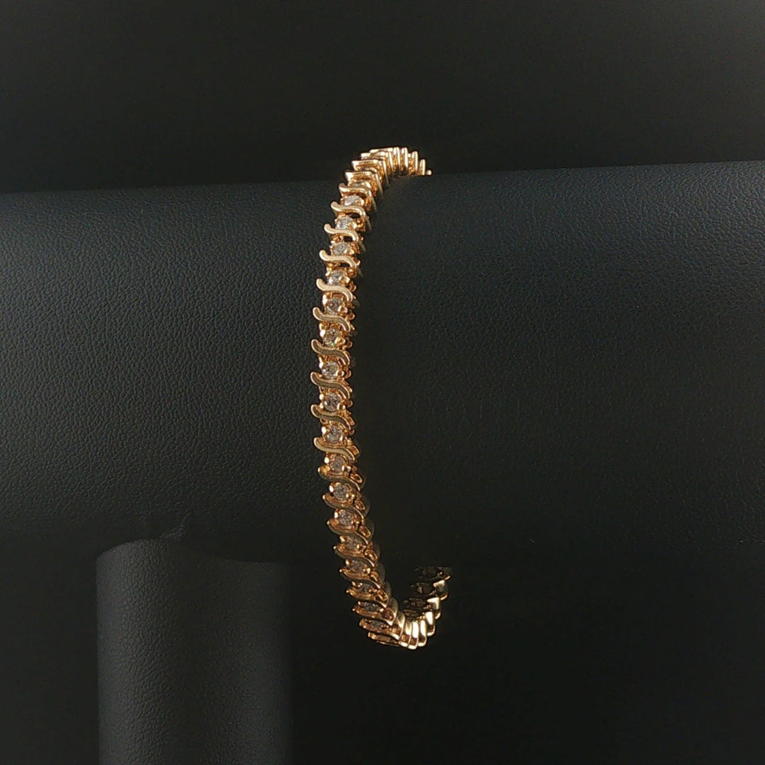 14k Yellow Gold and 1.50cttw Diamond S Link Vintage Tennis Bracelet 7"