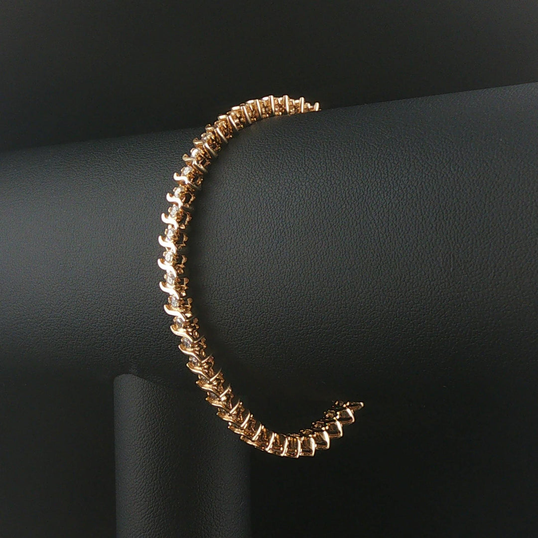 14k Yellow Gold and 1.50cttw Diamond S Link Vintage Tennis Bracelet 7"