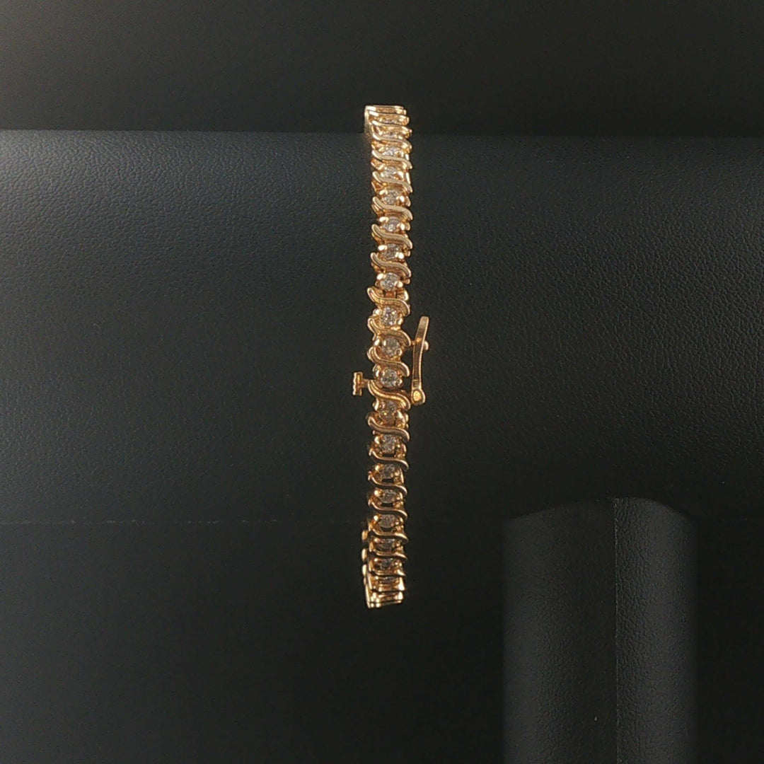 14k Yellow Gold and 1.50cttw Diamond S Link Vintage Tennis Bracelet 7"