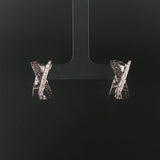 14k White Gold and 0.20cttw White and Black Diamond Huggie Earrings