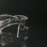 14k White Gold and 0.20cttw White and Black Diamond Huggie Earrings