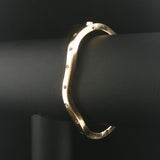 14k Yellow Gold and Diamond 9.7g Curved Wave Bangle Bracelet 6.85"
