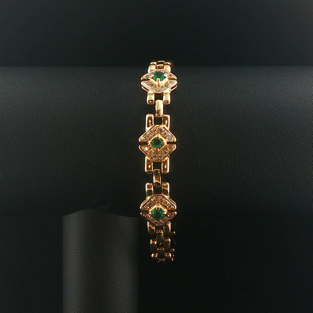 14k Yellow Gold Emerald and Diamond 16g Ladies Panther Link Bracelet 7.25"